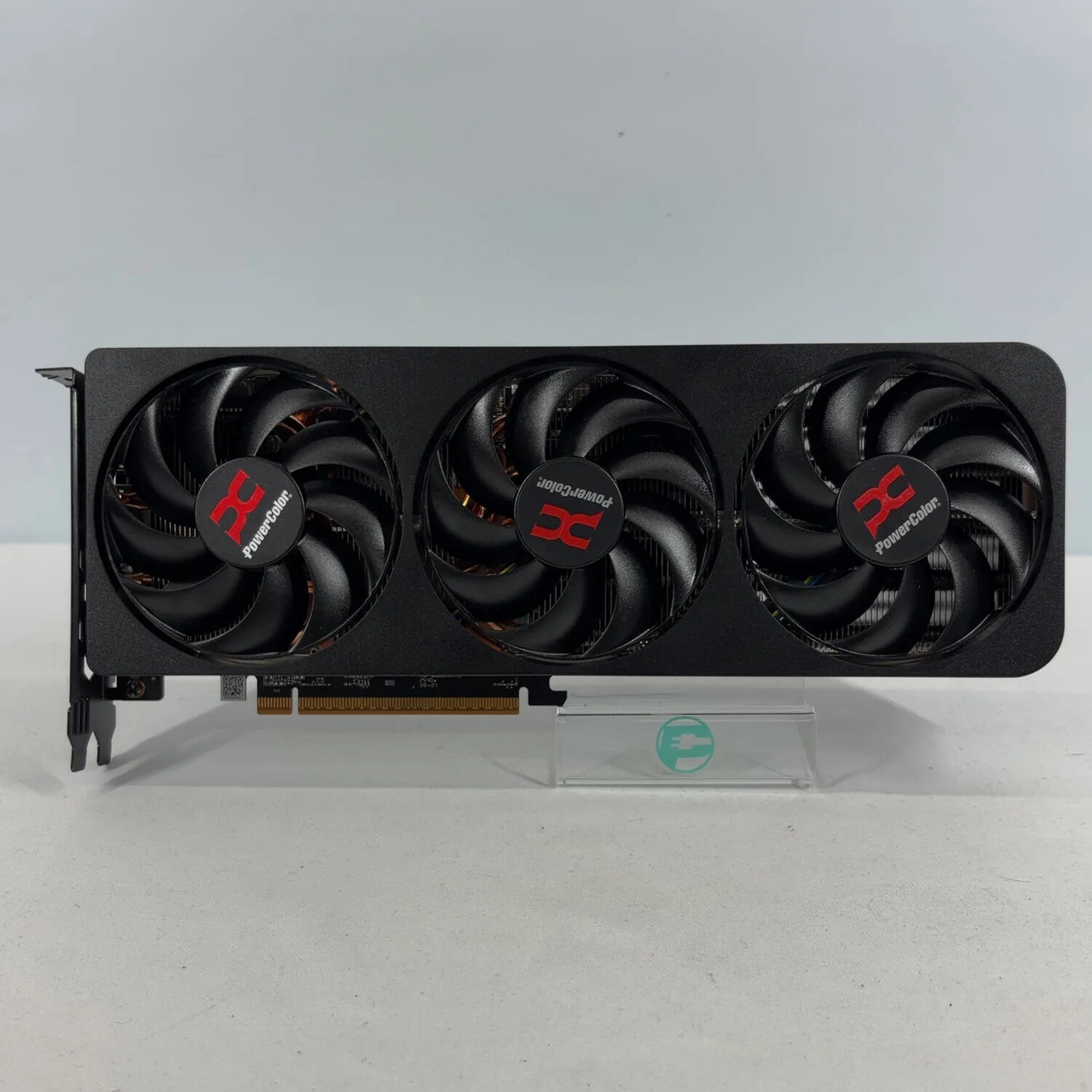 A PowerColor Reaper AMD Radeon RX 9070 XT graphics card with three fans