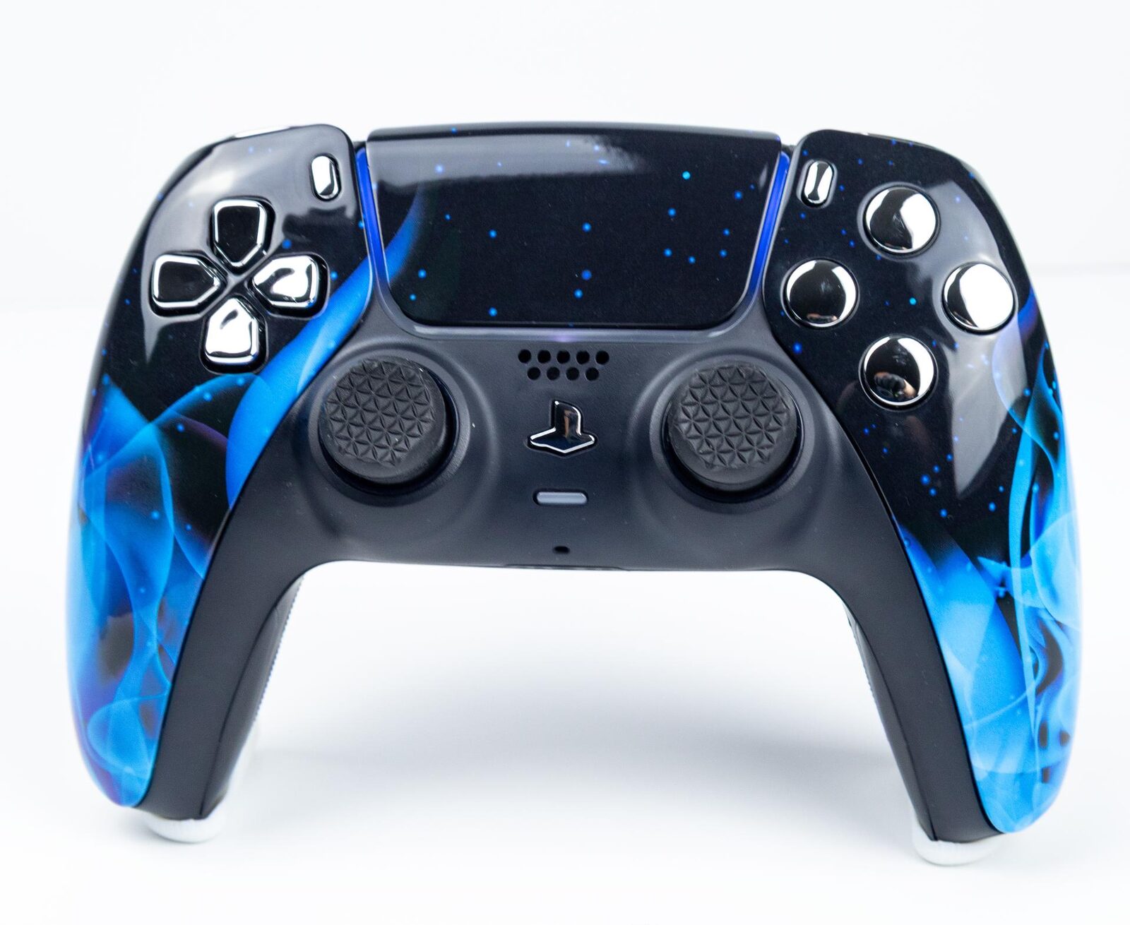 A PS5 DualSense controller with a custom blue flame hydro-dipped shell