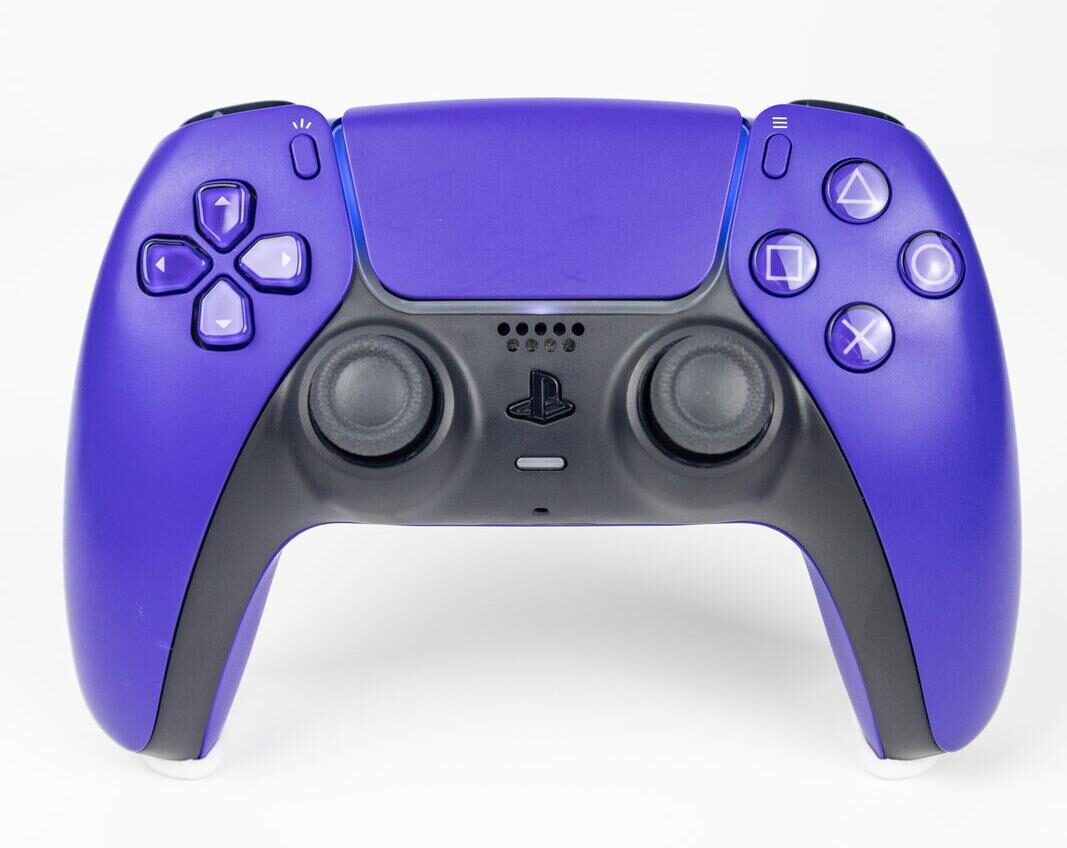 A PS5 DualSense controller in Galactic Purple, showing the face buttons and right stick