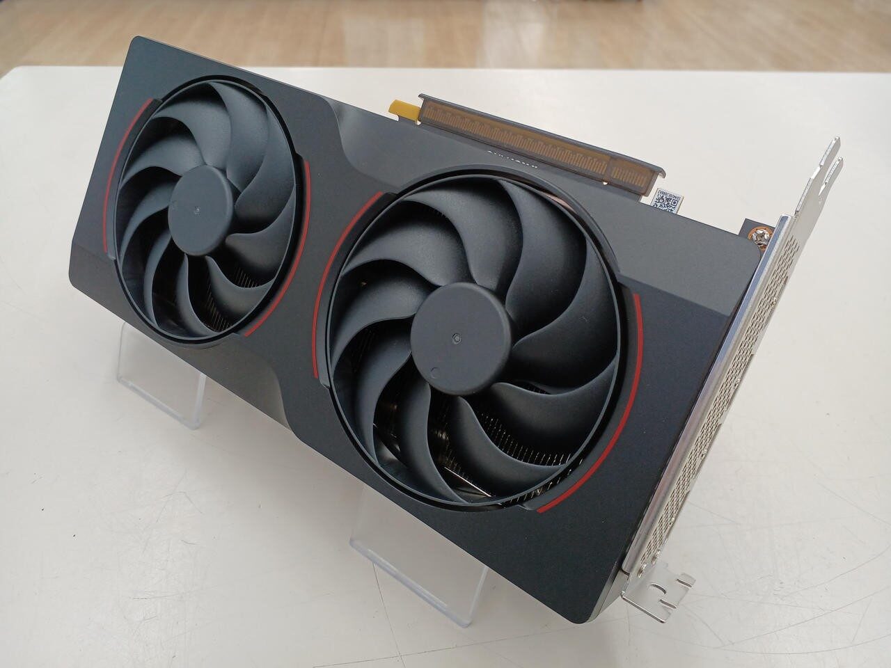 An Intel Arc B580 graphics card with twin fans, seen from the front